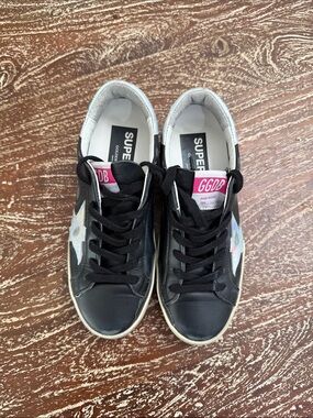 Golden Goose Black Leather Low-Top Sneakers with Iridescent Star